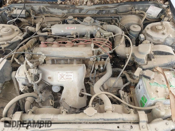 1990 Toyota Camry DLX z VIN 4T1SV21EXLU271320, wystawiony jako IAAI lot #41798353 z przebiegiem 269 178 mil mil oraz . Historia ofert i sprzedaży dostępna na DreamBid. Obrazek 10.