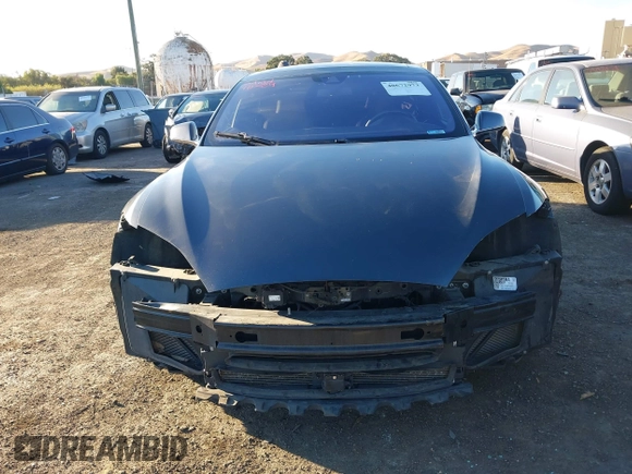 2015 Tesla Model S 85D with VIN 5YJSA1E28FF110066, listed as a IAAI auction lot 40672973 with 100,157 mi miles. Bid and sale history available at carsss.com. Image 13.
