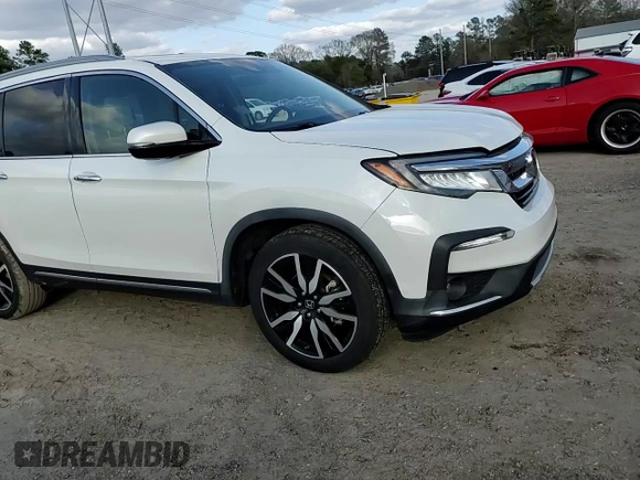 2021 Honda Pilot Touring 8-Passenger with VIN 5FNYF5H92MB001840, listed as a Copart auction lot 43236895 with 63,402 mi miles and Salvage Title. Bid and sale history available at DreamBid. Image 11.
