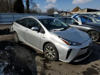 2021 Toyota Prius L Eco with VIN JTDKAMFU3M3147845, listed as a Copart auction lot 88705855 with 59,418 mi miles and Salvage Title. Bid and sale history available at carsss.com. Image 4.