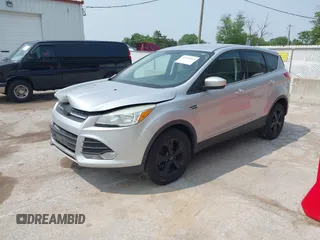 2014 Ford Escape SE with VIN 1FMCU9GX9EUD83148, listed as a IAAI auction lot 42449815 with 120,062 mi miles and . Bid and sale history available at DreamBid. Image 2.