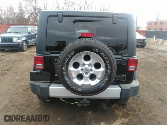 2014 Jeep Wrangler Sahara with VIN 1C4AJWBG9EL161712, listed as a IAAI auction lot 41839193 with 68,318 mi miles and . Bid and sale history available at DreamBid. Image 16.