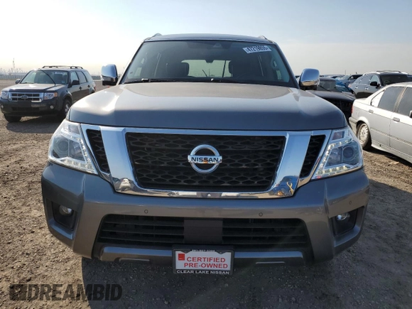 2019 Nissan Armada Platinum with VIN JN8AY2NF3K9350845, listed as a Copart auction lot 47219855 with 64,743 mi miles and Salvage title. Bid and sale history available at DreamBid. Image 5.
