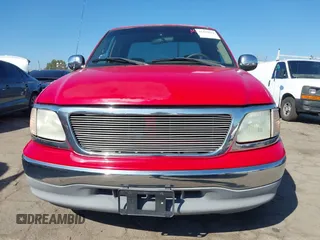 2002 Ford F-150 XL with VIN 1FTRX17W52NA81828, listed as a IAAI auction lot 41450811 with 201,948 mi miles. Bid and sale history available at carsss.com. Image 12.