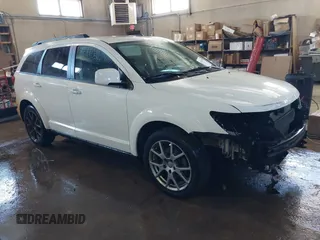 2015 Dodge Journey R/T with VIN 3C4PDDEGXFT574696, listed as a IAAI auction lot 41542460 with 153,044 mi miles and . Bid and sale history available at DreamBid. Image 1.
