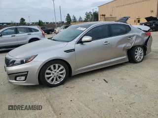 2014 Kia Optima EX z VIN 5XXGN4A72EG289004, wystawiony jako Copart lot #49433745 z przebiegiem 127 012 mil mil oraz Szkoda całkowita • Salvage title. Historia ofert i sprzedaży dostępna na DreamBid. Obrazek 1.
