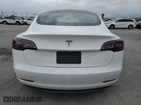 2023 Tesla Model 3 с VIN 5YJ3E1EA3PF557941, выставлен на аукционе Copart как лот 53047505 с пробегом 53 060 миль миль и Списание • Salvage title. История ставок и продаж доступна на DreamBid. Изображение 6.