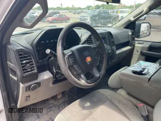2018 Ford F-150 XL with VIN 1FTFX1E55JKE18902, listed as a IAAI auction lot 42141748 with 160,079 mi miles. Bid and sale history available at carsss.com. Image 1.