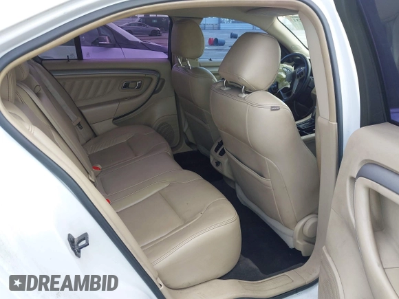 2013 Ford Taurus SEL with VIN 1FAHP2E81DG121759, listed as a IAAI auction lot 41939931 with 110,756 mi miles. Bid and sale history available at carsss.com. Image 8.