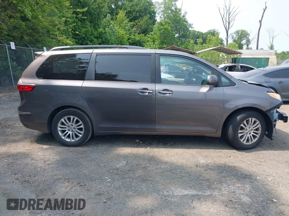 2015 Toyota Sienna XLE with VIN 5TDYK3DC6FS553695, listed as a IAAI auction lot 42418507 with 137,677 mi miles and . Bid and sale history available at DreamBid. Image 13.