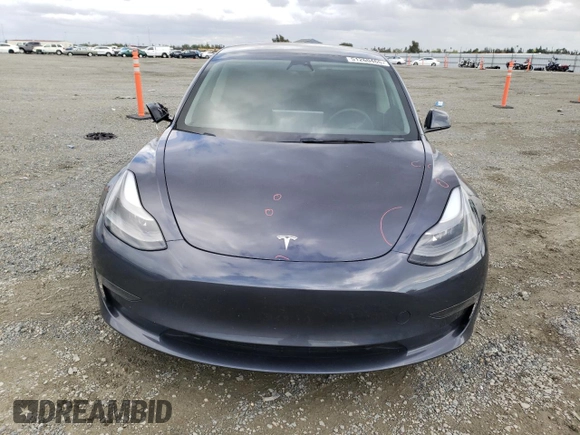 2023 Tesla Model 3 with VIN 5YJ3E1EA7PF395196, listed as a Copart auction lot 51260465 with 41,119 mi miles and Salvage title. Bid and sale history available at DreamBid. Image 5.