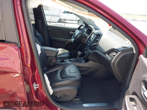 2019 Jeep Cherokee Limited with VIN 1C4PJMDX1KD322345, listed as a IAAI auction lot 42471638 with 36,031 mi miles and . Bid and sale history available at DreamBid. Image 5.