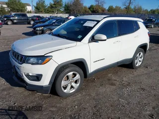 2020 Jeep Compass Latitude with VIN 3C4NJDBB2LT115599, listed as a IAAI auction lot 40970548 with 63,349 mi miles. Bid and sale history available at carsss.com. Image 17.