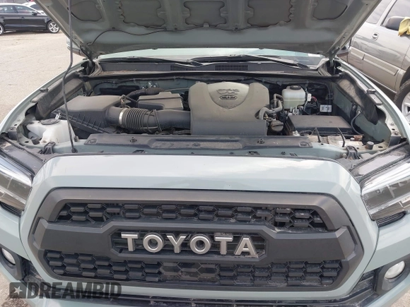 2022 Toyota Tacoma SR with VIN 3TMCZ5AN0NM507320, listed as a IAAI auction lot 42220296 with 33,342 mi miles and . Bid and sale history available at DreamBid. Image 10.