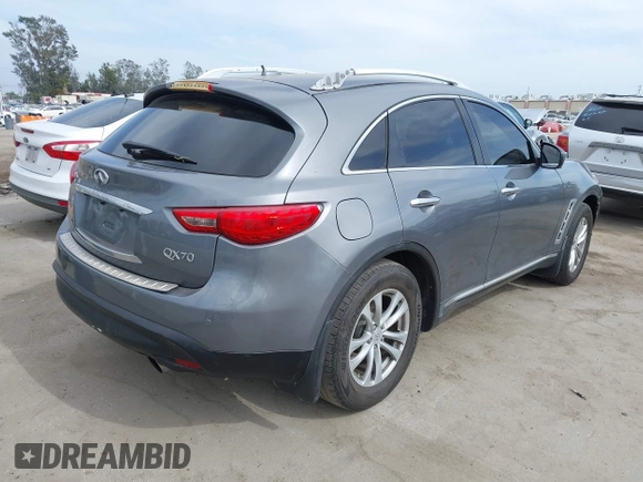 2014 Infiniti QX70 with VIN JN8CS1MU8EM450428, listed as a IAAI auction lot 42233727 with 88,342 mi miles and . Bid and sale history available at DreamBid. Image 4.