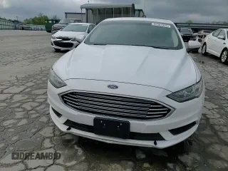 2018 Ford Fusion SE z VIN 3FA6P0LU2JR234975, wystawiony jako Copart lot #52562945 z przebiegiem 148 801 mil mil oraz Szkoda całkowita • Salvage title. Historia ofert i sprzedaży dostępna na DreamBid. Obrazek 14.