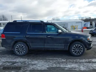 2015 Lincoln Navigator with VIN 5LMJJ2JT1FEJ03101, listed as a IAAI auction lot 41158169 with 159,249 mi miles. Bid and sale history available at carsss.com. Image 13.