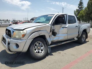 2011 Toyota Tacoma with VIN 5TFJX4GN4BX003910, listed as a Copart auction lot 62426305 with 154,634 mi miles and Salvage title. Bid and sale history available at DreamBid. Image 1.