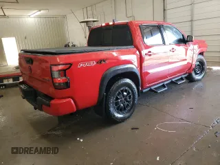 2022 Nissan Frontier SV with VIN 1N6ED1EK4NN664464, listed as a Copart auction lot 48712505 with 86,819 mi miles and Salvage title. Bid and sale history available at DreamBid. Image 3.