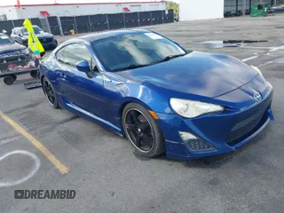 2013 Scion FR-S with VIN JF1ZNAA13D2733259, listed as a IAAI auction lot 41876078 with 120,321 mi miles. Bid and sale history available at carsss.com. Image 1.