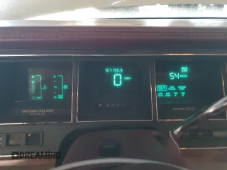 1994 Lincoln Town Car Executive z VIN 1LNLM81W9RY755340, wystawiony jako Copart lot #68571884 z przebiegiem 167 150 mil mil oraz Szkody całkowita. Historia ofert i sprzedaży dostępna na DreamBid. Obrazek 9.