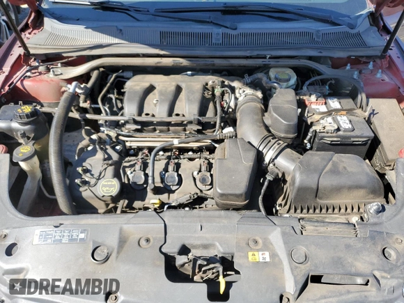 2015 Ford Taurus Limited с VIN 1FAHP2F86FG101525, выставлен на аукционе Copart как лот 58062345 с пробегом 168 122 миль миль и Списание • Salvage title. История ставок и продаж доступна на DreamBid. Изображение 11.