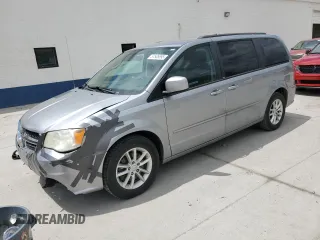 2014 Dodge Grand Caravan SXT z VIN 2C4RDGCG7ER290814, wystawiony jako Copart lot #57506695 z przebiegiem 156 357 mil mil oraz Szkoda całkowita • Salvage title. Historia ofert i sprzedaży dostępna na DreamBid. Obrazek 1.