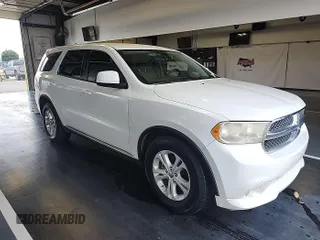 2013 Dodge Durango SXT with VIN 1C4RDJAG8DC671689, listed as a IAAI auction lot 42743958 with 160,950 mi miles and . Bid and sale history available at DreamBid. Image 14.