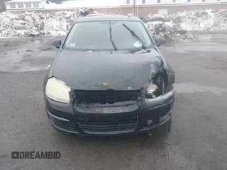 2008 Volkswagen Jetta Sedan S with VIN 3VWJZ71K18M089389, listed as a IAAI auction lot 41676123 with 136,782 mi miles. Bid and sale history available at carsss.com. Image 6.