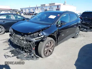 2023 Volkswagen ID.4 Pro z VIN 1V2DNPE85PC028748, wystawiony jako IAAI lot #41348983 z przebiegiem 7 434 mil mil oraz . Historia ofert i sprzedaży dostępna na DreamBid. Obrazek 19.