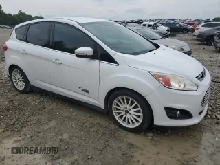 2016 Ford C-Max Energi SEL with VIN 1FADP5CU4GL118415, listed as a Copart auction lot 63261644 with 100,392 mi miles and Salvage Title. Bid and sale history available at carsss.com. Image 4.
