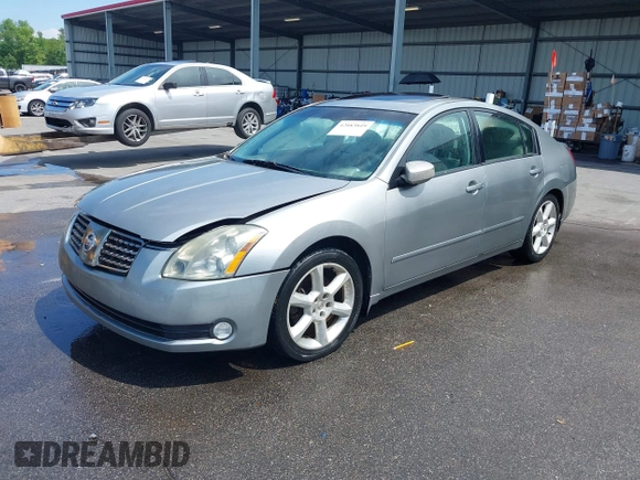 2004 Nissan Maxima SE with VIN 1N4BA41EX4C881792, listed as a IAAI auction lot 42083849 with 166,034 mi miles. Bid and sale history available at carsss.com. Image 2.