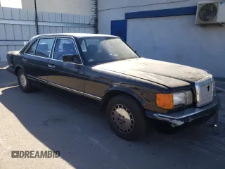 1989 Mercedes-Benz 560 with VIN WDBCA39E0KA446817, listed as a Copart auction lot 81615244 with 270,136 mi miles and Salvage Title. Bid and sale history available at DreamBid. Image 4.