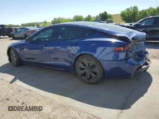 2023 Tesla Model S with VIN 5YJSA1E58PF531121, listed as a Copart auction lot 63683355 with Not provided miles and Salvage title. Bid and sale history available at DreamBid. Image 2.