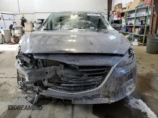 2015 Mazda 3 S Grand Touring with VIN JM1BM1W32F1242067, listed as a Copart auction lot 45106154 with 147,435 mi miles and Salvage Title. Bid and sale history available at DreamBid. Image 5.