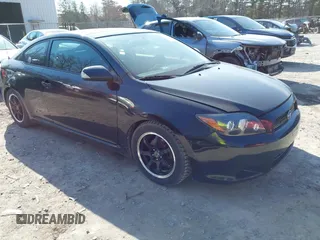 2009 Scion tC with VIN JTKDE167390300957, listed as a IAAI auction lot 42102405 with 91,768 mi miles. Bid and sale history available at carsss.com. Image 1.