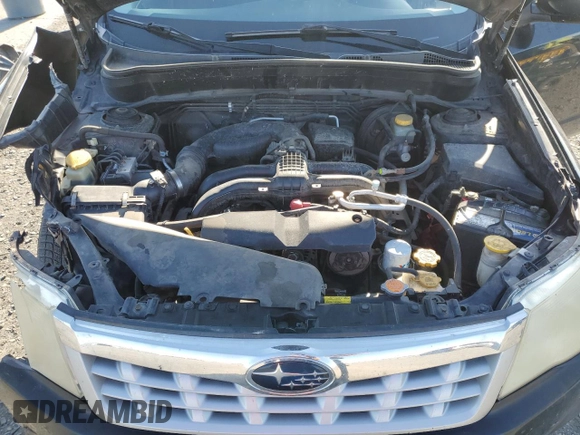 2011 Subaru Forester X z VIN JF2SHABC3BH740906, wystawiony jako Copart lot #54742575 z przebiegiem 181 927 mil mil oraz Szkoda całkowita • Salvage title. Historia ofert i sprzedaży dostępna na DreamBid. Obrazek 12.