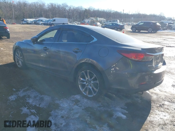 2014 Mazda 6 i Grand Touring with VIN JM1GJ1W67E1137886, listed as a IAAI auction lot 41405112 with 159,879 mi miles and . Bid and sale history available at DreamBid. Image 3.