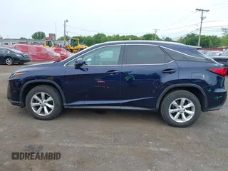 2016 Lexus RX 350 with VIN 2T2BZMCA6GC010568, listed as a IAAI auction lot 42352197 with 72,146 mi miles and . Bid and sale history available at DreamBid. Image 14.