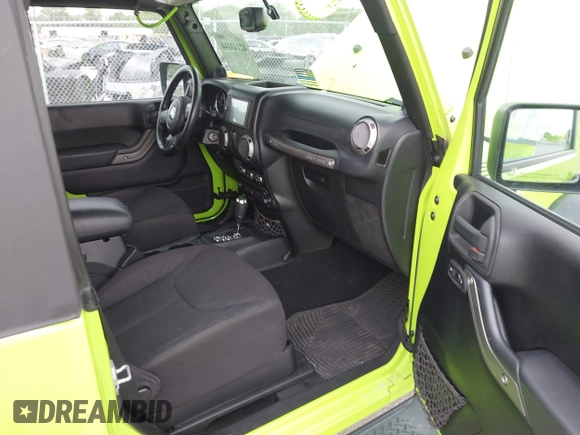 2013 Jeep Wrangler Sport with VIN 1C4AJWAG8DL507944, listed as a IAAI auction lot 42143144 with 70,085 mi miles and . Bid and sale history available at carsss.com. Image 5.