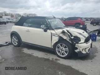 2011 MINI Convertible S with VIN WMWZP3C54BTX83253, listed as a Copart auction lot 49879485 with Not Provided miles and Salvage Title. Bid and sale history available at DreamBid. Image 4.