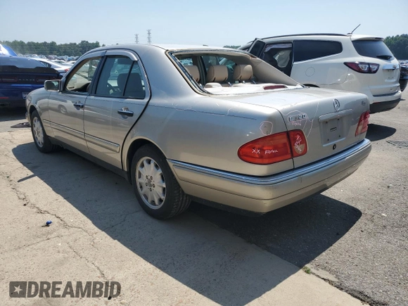 1999 Mercedes-Benz E-Class with VIN WDBJF65H2XA796208, listed as a Copart auction lot 62738904 with 156,283 mi miles and Salvage Title. Bid and sale history available at carsss.com. Image 2.