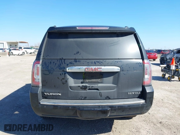 2016 GMC Yukon Denali with VIN 1GKS2CKJ8GR337441, listed as a IAAI auction lot 41485647 with 171,874 mi miles. Bid and sale history available at carsss.com. Image 16.
