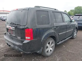 2012 Honda Pilot Touring z VIN 5FNYF4H92CB074778, wystawiony jako IAAI lot #42267913 z przebiegiem 138 362 mil mil oraz . Historia ofert i sprzedaży dostępna na DreamBid. Obrazek 4.