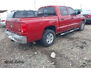 2006 Dodge Dakota SLT with VIN 1D7HE48J06S558586, listed as a IAAI auction lot 41591673 with 252,722 mi miles. Bid and sale history available at carsss.com. Image 4.