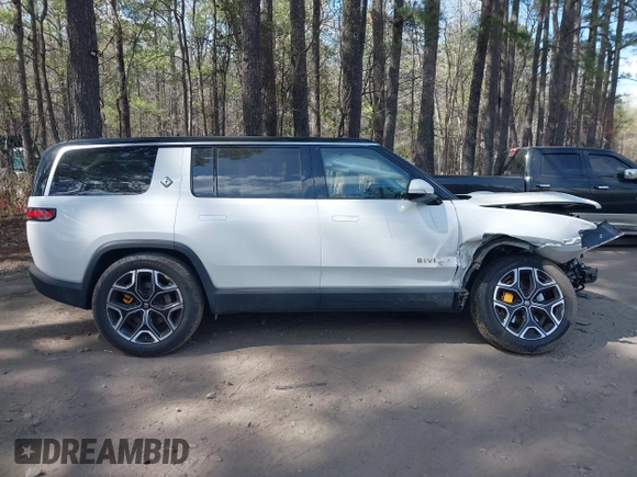 2023 Rivian R1S Launch Edition with VIN 7PDSGABL5PN006609, listed as a IAAI auction lot 41903200 with Not Provided miles. Bid and sale history available at carsss.com. Image 13.