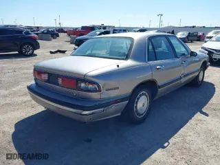 1995 Buick LeSabre Custom with VIN 1G4HP52L5SH487893, listed as a IAAI auction lot 41680378 with 121,742 mi miles. Bid and sale history available at carsss.com. Image 4.