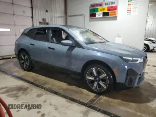 2024 BMW iX xDrive50 z VIN WB523CF0XRCP21815, wystawiony jako Copart lot #51520885 z przebiegiem 6 664 mil mil oraz Szkoda całkowita • Salvage title. Historia ofert i sprzedaży dostępna na DreamBid. Obrazek 4.
