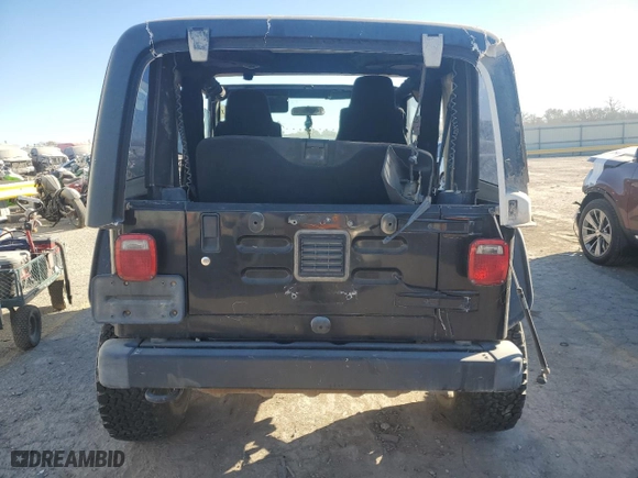 2004 Jeep Wrangler Sport with VIN 1J4FA49S64P717397, listed as a Copart auction lot 82970994 with 0 mi miles and Salvage Title. Bid and sale history available at carsss.com. Image 6.
