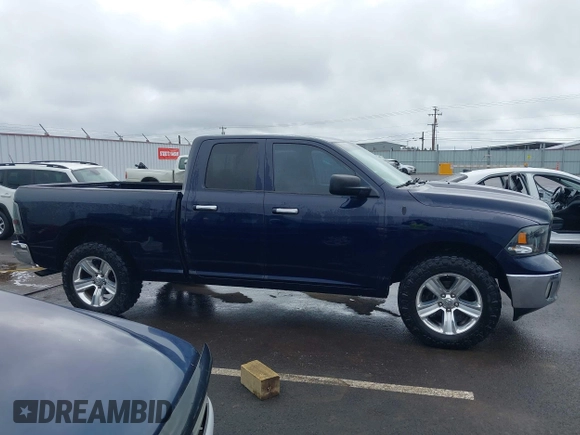 2015 Ram 1500 Outdoorsman z VIN 1C6RR7GT6FS508211, wystawiony jako IAAI lot #42044889 z przebiegiem 125 774 mil mil oraz . Historia ofert i sprzedaży dostępna na DreamBid. Obrazek 13.